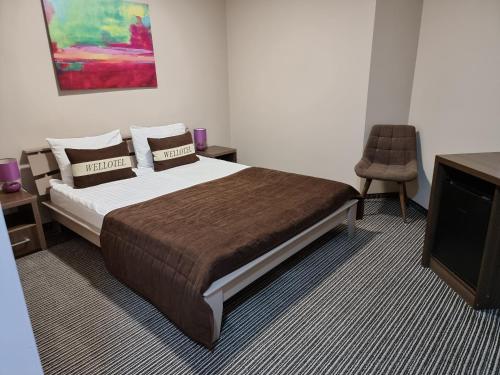 尤之尼康樂酒店房間的床