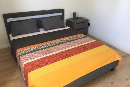 Postel nebo postele na pokoji v ubytování Ylang Résidence avec piscine chauffée & jacuzzi