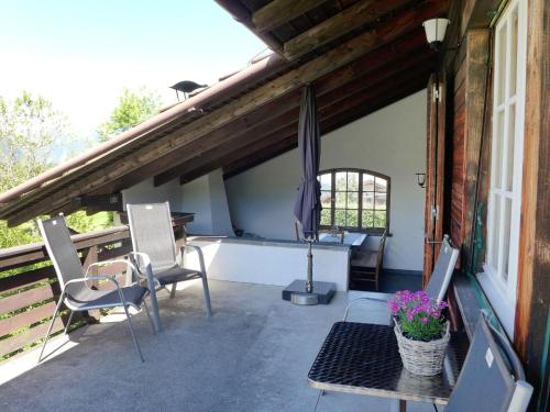 Balkón nebo terasa v ubytování Chalet Panoramablick by Interhome