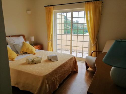 Postel nebo postele na pokoji v ubytování Casa Loureiro - Vista Rio Douro