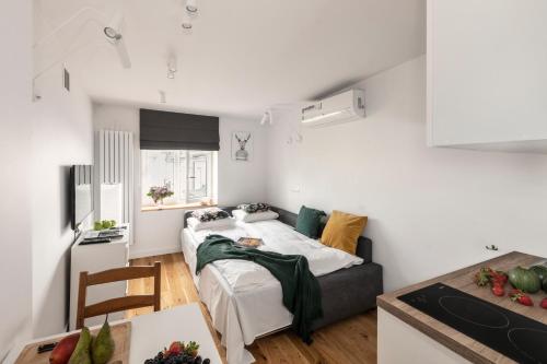 Posteľ alebo postele v izbe v ubytovaní ShortStayPoland Wilcza (B42)