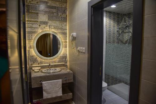 Kúpeľňa v ubytovaní غيوم للفلل الفندقية