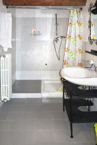 a bathroom with a sink and a shower at Holiday Home Ginestre 4 by Interhome in Santo