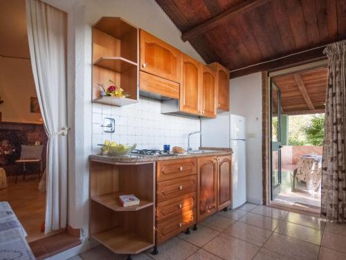 Kuchyň nebo kuchyňský kout v ubytování Holiday Home Piccola Oasi-1 by Interhome
