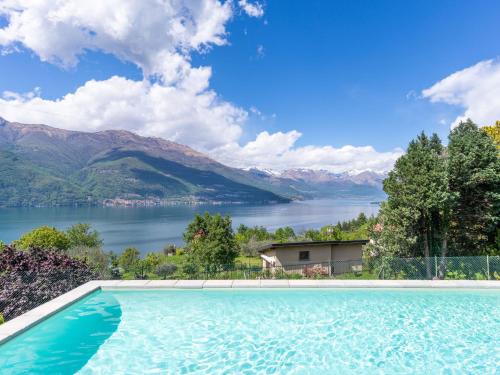 a swimming pool with a view of a lake at Holiday Home Casa Rina by Interhome in Perledo