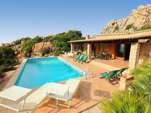 The swimming pool at or close to Villa Petra Rossa by Interhome