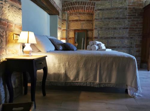 Postel nebo postele na pokoji v ubytování Agriturismo Airale