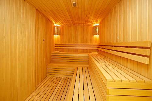 an empty sauna with wooden panels and lights at Grand Hotel Gulsoy Old City in Istanbul