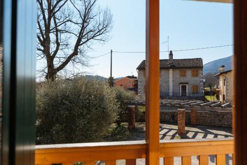 a view of a house from a window at Albergo Diffuso Polcenigo C. Zoldan in Polcenigo