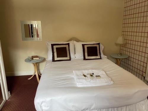 Ένα ή περισσότερα κρεβάτια σε δωμάτιο στο Bertie Pontypridd