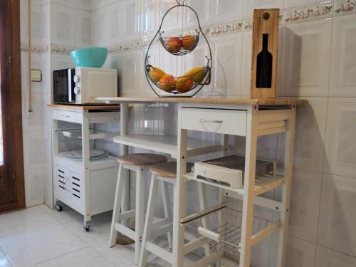 A kitchen or kitchenette at Apartamento Turístico Duero Niño