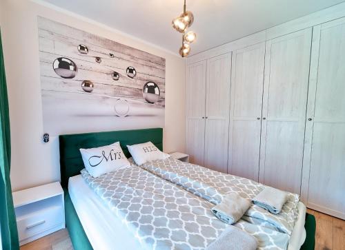 Posteľ alebo postele v izbe v ubytovaní LAGUNA Apartament Polanica Residence 27 -SPA-