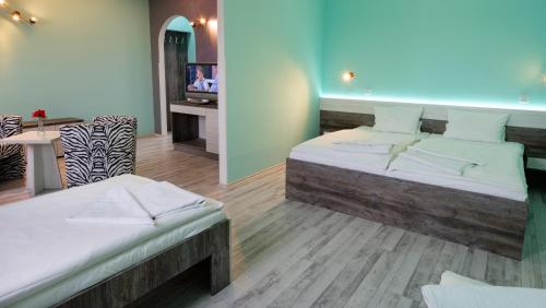 Katil atau katil-katil dalam bilik di Hotel N
