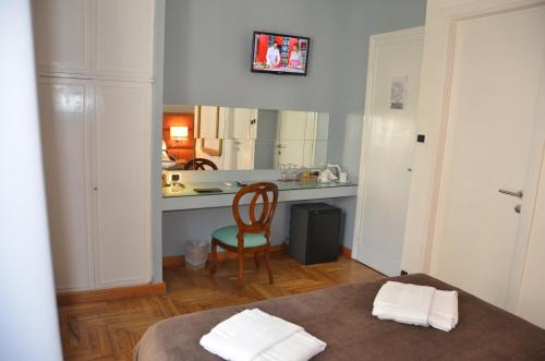 Posteľ alebo postele v izbe v ubytovaní Sweet Home Parioli