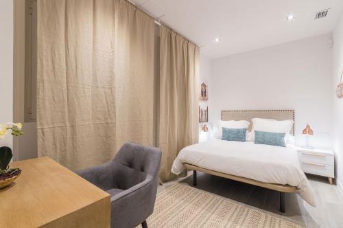 Llit o llits en una habitació de Avenida America en Madrid Capital