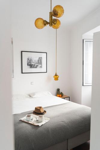Ένα ή περισσότερα κρεβάτια σε δωμάτιο στο Comercial Boutique Guest House