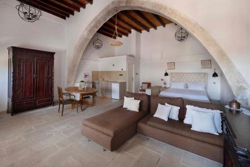 En eller flere senge i et værelse på Cottage Houses