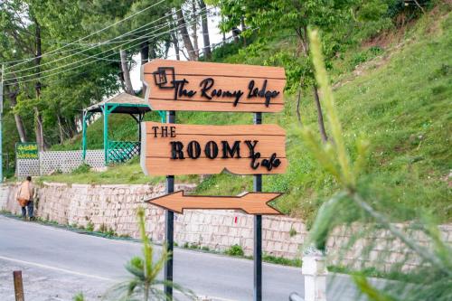 a street sign that reads theaky have the rowdn at The Roomy Lodge, Murree in Murree
