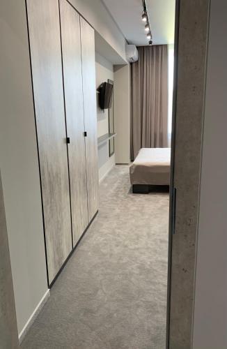 Postel nebo postele na pokoji v ubytování Red Cube Hotel