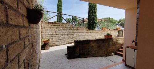 a set of stairs in a house with a stair case at Locanda Mossa Dei Barbari in Buriano