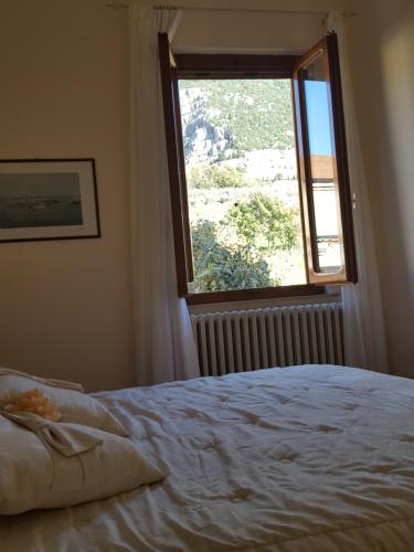 Postel nebo postele na pokoji v ubytování B&B Via della Grotta