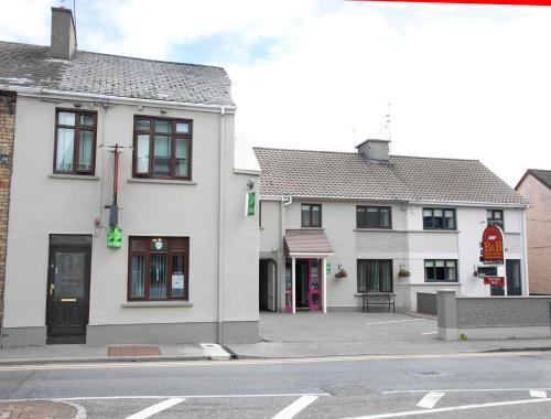 a group of buildings on the side of a street at Arch House B&B & Apartments in Athlone