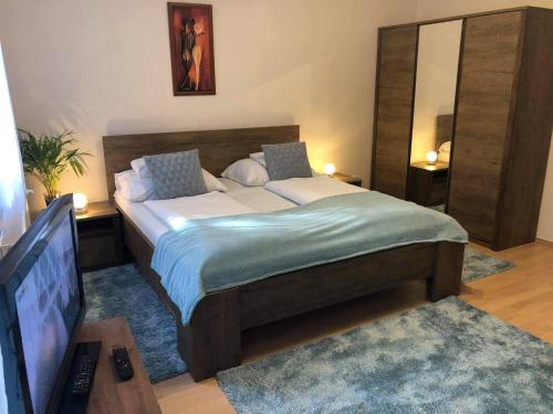 Posteľ alebo postele v izbe v ubytovaní Hévíz Lake Apartman