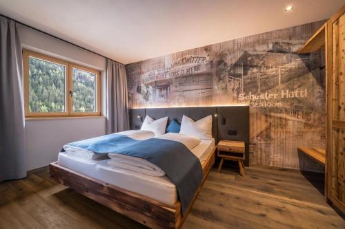 Llit o llits en una habitació de Seebrunn - Schusterhüttl Alm