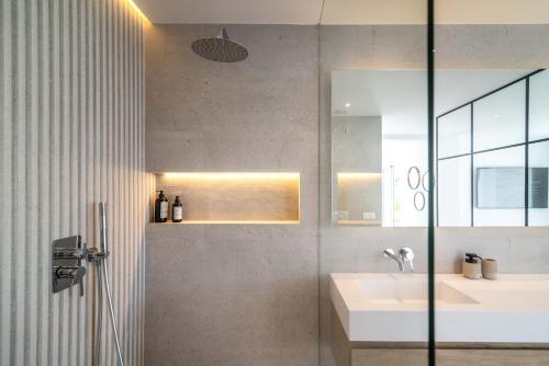 a bathroom with a sink and a shower at Exclusive House located in Prime location in Marbella