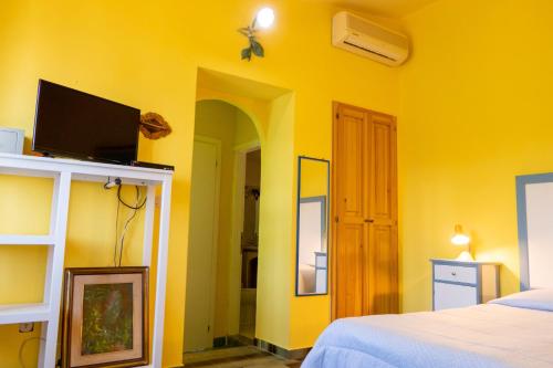 Postel nebo postele na pokoji v ubytování B&b Giglio di Mare
