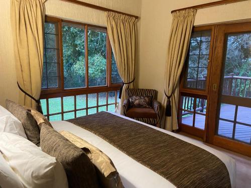 Ένα ή περισσότερα κρεβάτια σε δωμάτιο στο Kruger Park Lodge, Kubu Lodge 224
