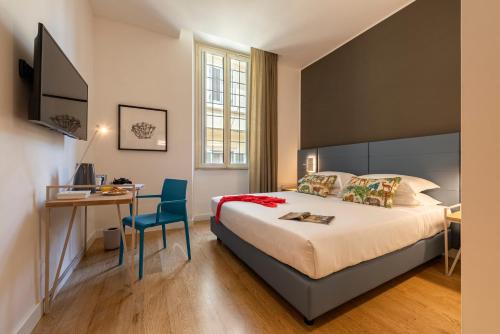 A bed or beds in a room at Giuditta in Trastevere