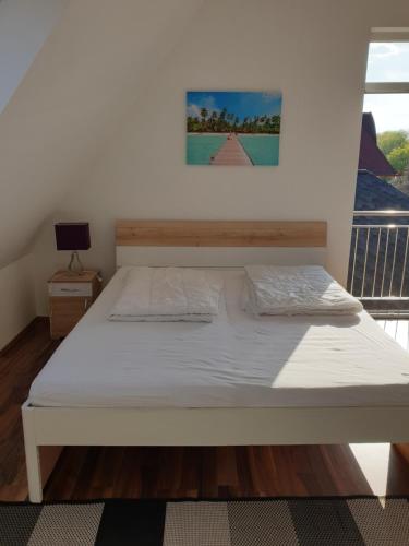Postel nebo postele na pokoji v ubytování Aroma Apartman