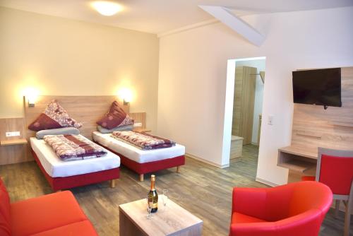 TV a/nebo společenská místnost v ubytování Hotel Da Sabino