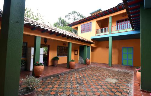 Foto da galeria de Casona 1865 em Ráquira