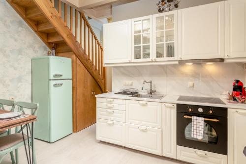 Kuchyň nebo kuchyňský kout v ubytování Oneiro Residence