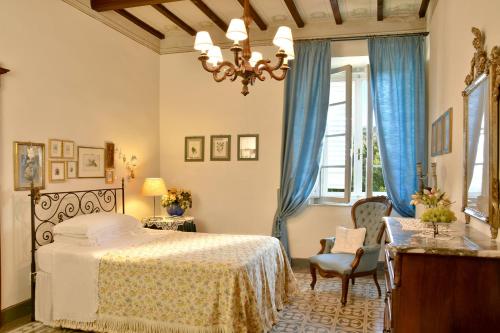 Postel nebo postele na pokoji v ubytování Villa Carlotta con piscina