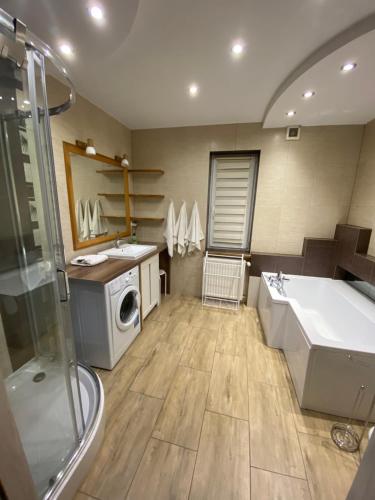 Kúpeľňa v ubytovaní Zaciszne Domki Apartamenty