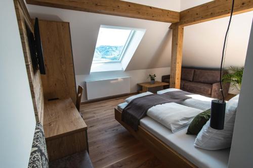 En eller flere senge i et værelse på Hochhubergut
