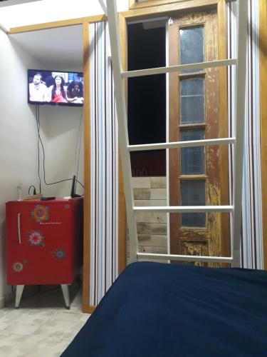 TV/trung tâm giải trí tại SapucAli Hostel Privativo