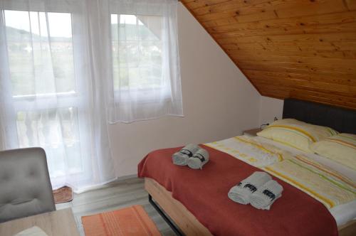 Postel nebo postele na pokoji v ubytování Kristály Panoráma Villa