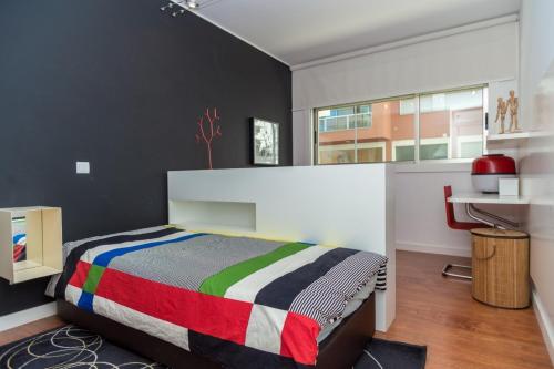 Postel nebo postele na pokoji v ubytování Praia da Rocha Edifício Foz Palace t2