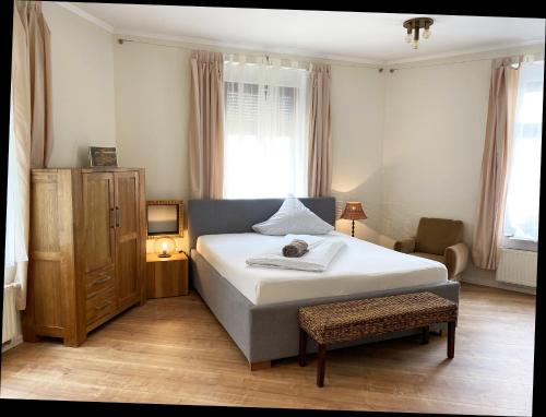 Postel nebo postele na pokoji v ubytování Apartment Eva