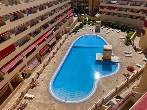 Bazén v ubytovaní Bonito apartamento cerca del mar alebo v jeho blízkosti