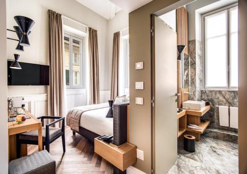 Posteľ alebo postele v izbe v ubytovaní DBH – Boutique Hotel Lake Como