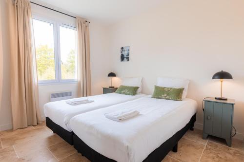 Ένα ή περισσότερα κρεβάτια σε δωμάτιο στο Les Forges Villas - 4 room villa for 8 people