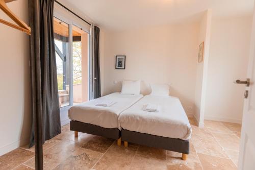 Ένα ή περισσότερα κρεβάτια σε δωμάτιο στο Les Forges Villas - 4 room villa for 8 people