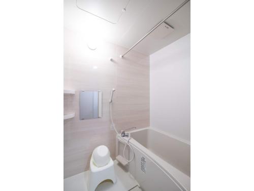 a bathroom with a white toilet in a room at Arbor house - Vacation STAY 86731 in Kagoshima