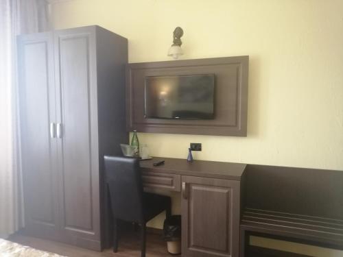 TV a/nebo společenská místnost v ubytování Hotel Piemonte