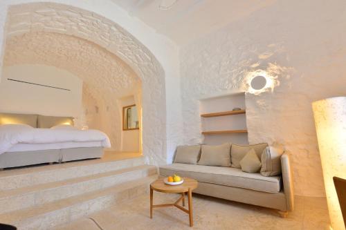 Ένα ή περισσότερα κρεβάτια σε δωμάτιο στο Πύργος Μαυρομιχάλη